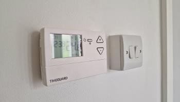 Decorative image showing thermostat